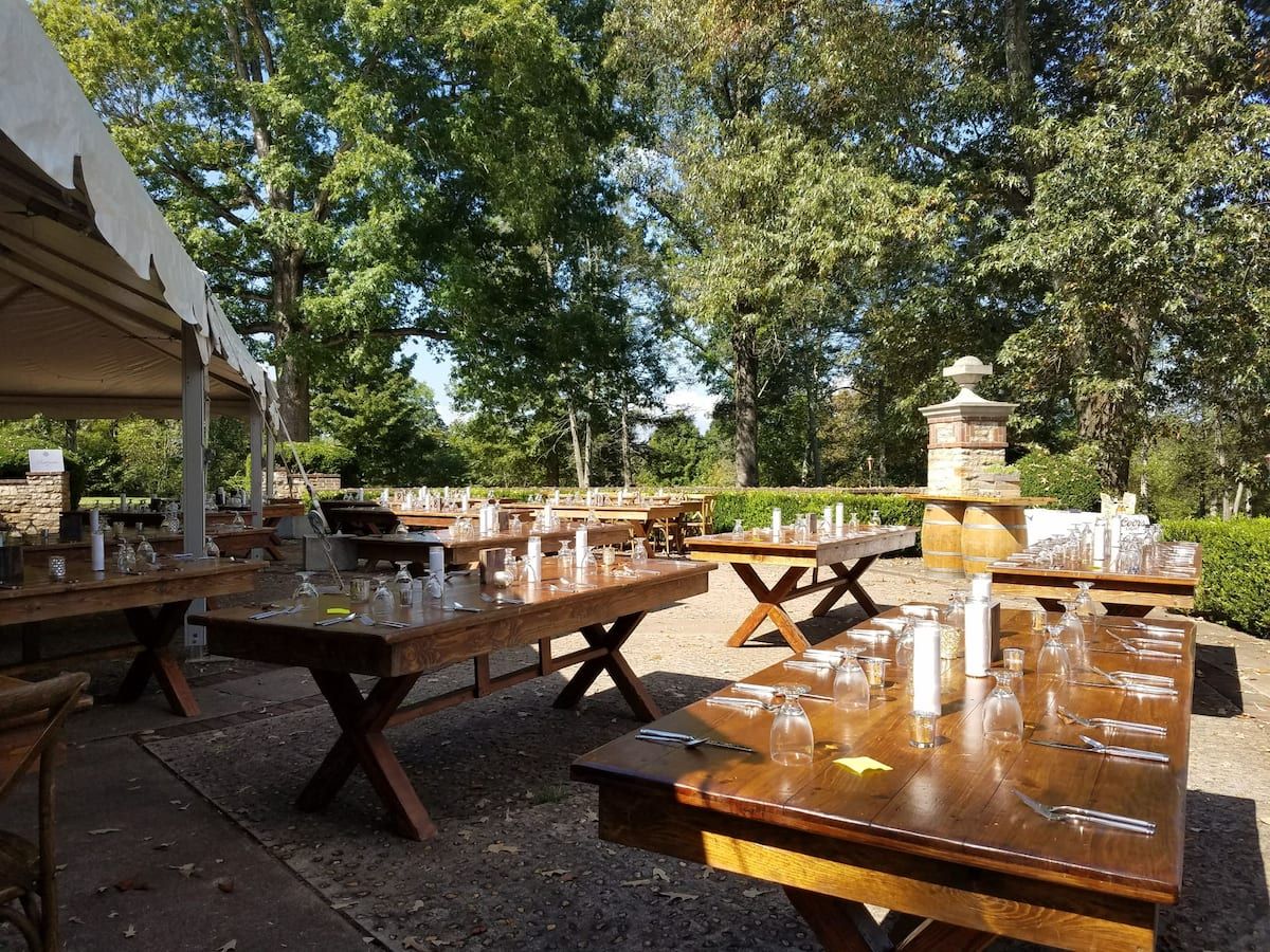 Outdoor dining tables set for reception