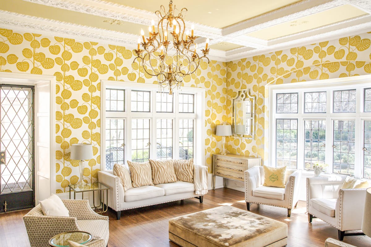 Yellow wallpaper sunroom from alternate angle